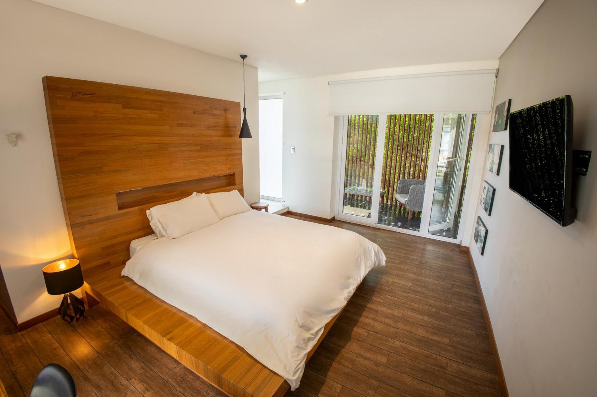 Cosmopolitano Hotel Boutique Santa Cruz de La Sierra Exterior foto A bedroom at the hotel