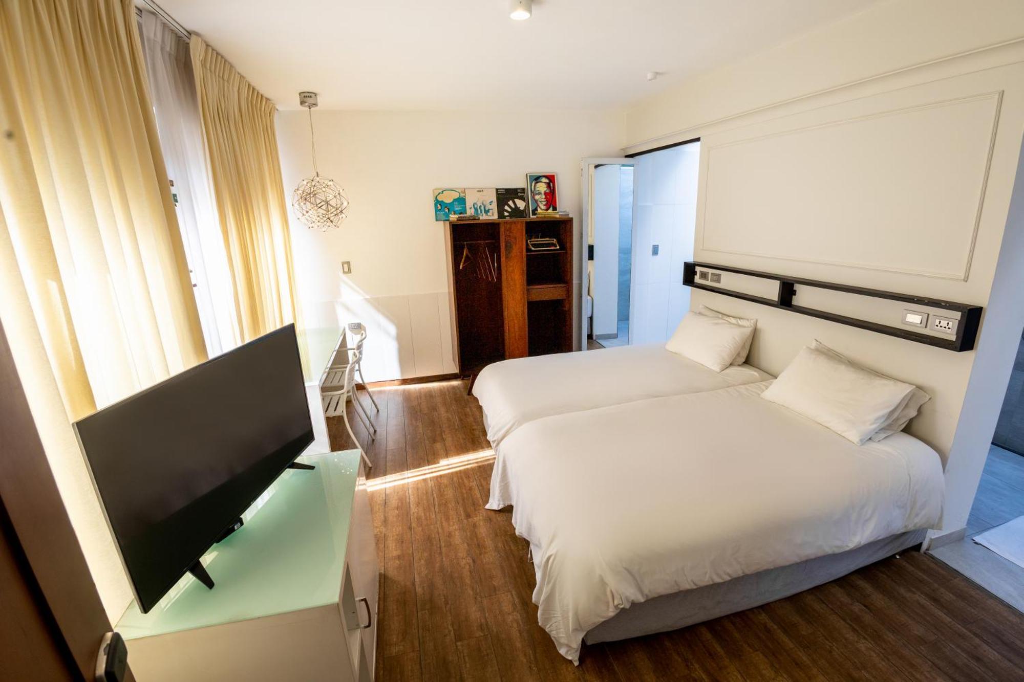 Cosmopolitano Hotel Boutique Santa Cruz de La Sierra Exterior foto A room at the hotel