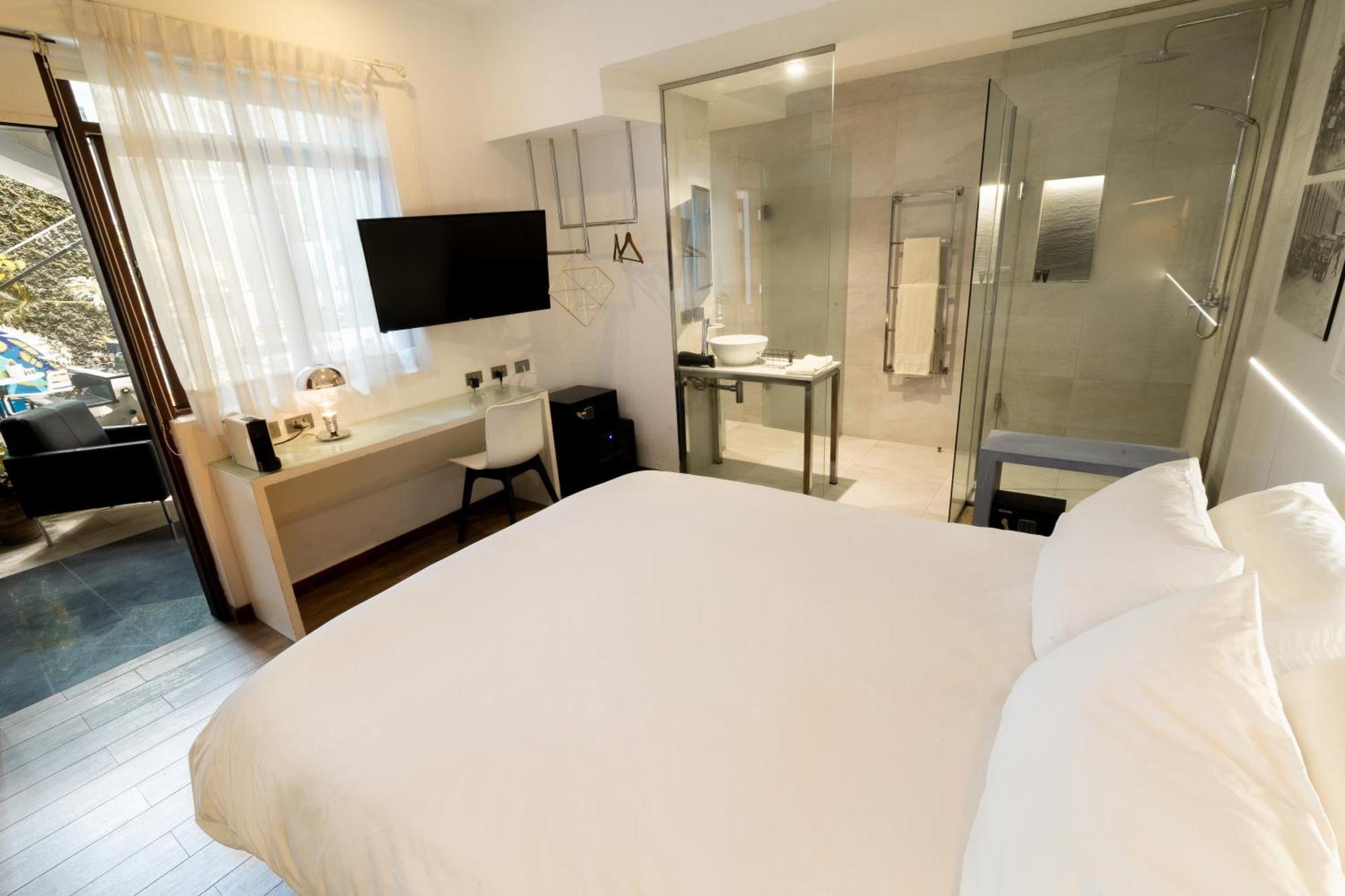 Cosmopolitano Hotel Boutique Santa Cruz de La Sierra Exterior foto A room at the hotel